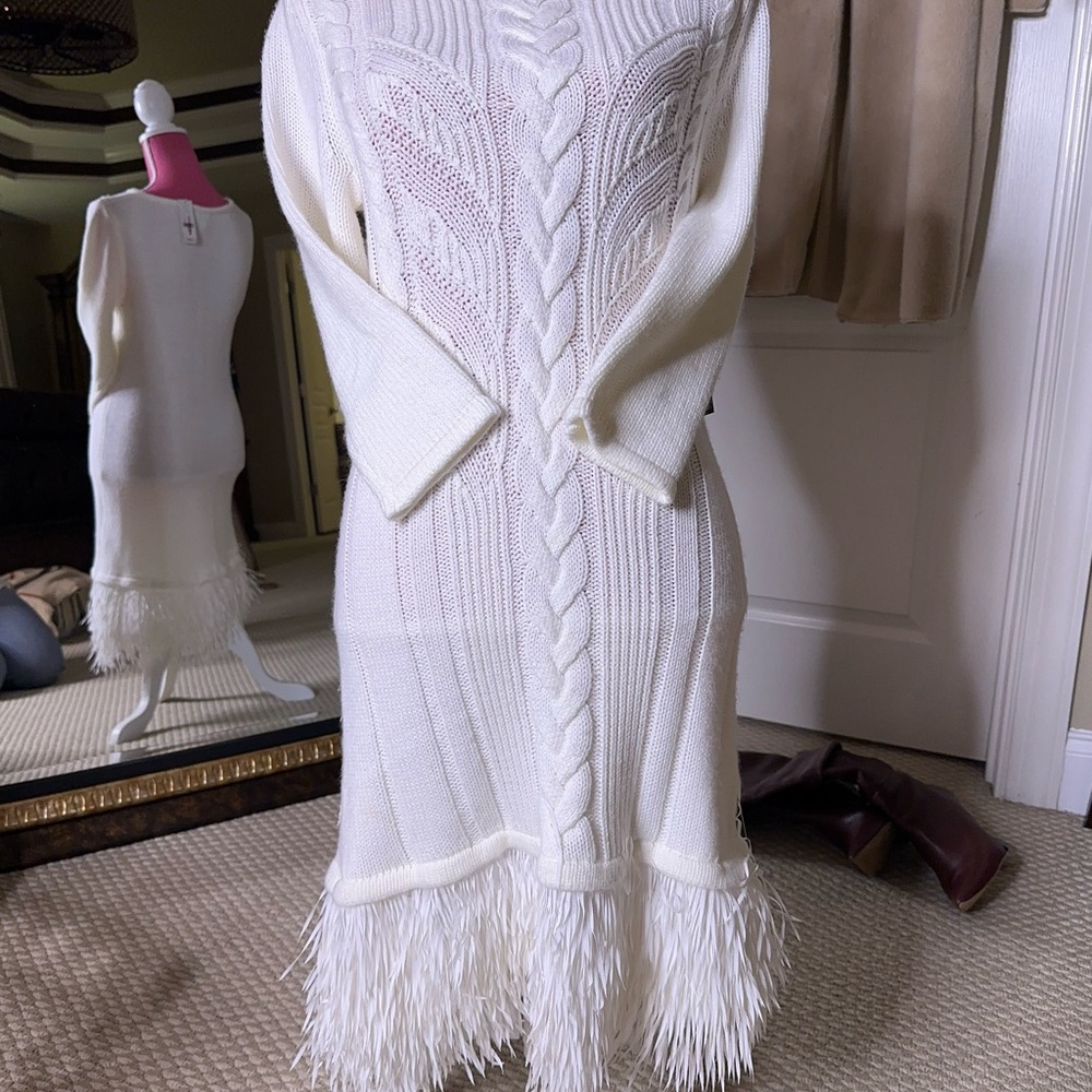 Flirty winter white cable knit dress.